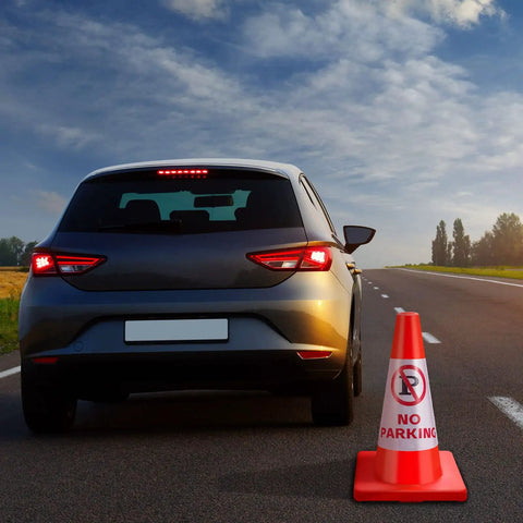 Car parked on roadside with Six Pack 18 Inch No Parking Reflective Traffic Cones With 360 Reflective Collars beside it