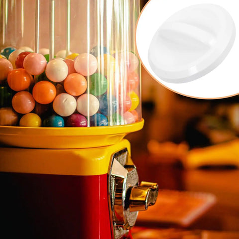 Upgrade Your Arcade Vibes With This Round Plastic Replacement Knob For Vending Machines And Party Games, shown above vending gumball machine.