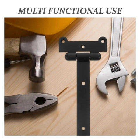Beefy Heavy Duty T Shaped Gate Hinges With Black Finish for smooth quiet operation shown with tools on a wooden background