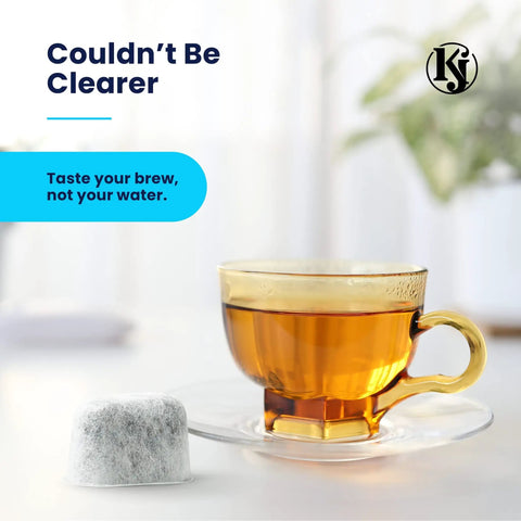 Glass cup of tea next to a charcoal coffee filter, promoting 12 Pack Universal Replacement Filters For Coffee Machines Using K Cups
