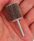Close-up of a single abrasive wheel from the Double Layer Flap Wheel Sander Kit For Drill 50 Piece Set with steel shaft.