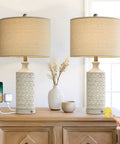24 Inch Rustic Modern Ceramic Table Lamp Set Of 2 For Living Room And Bedroom White And Grey Finish Farmhouse Nightstand End Table Decor Lamps Cozy Desk Lighting For Bedside Workspace And Kids Room, on a wooden table with USB charging.