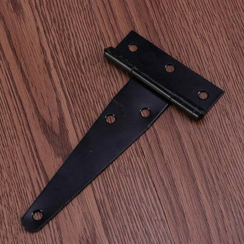 Heavy Duty Iron T Shape Door Hinges, 4 Inch Black, 6 Screw Holes, on wooden surface