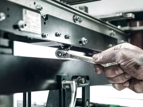 Using Ultra Slim Metal Ratchet Set With Switch Lever And Long Handle For Easy Swaps One Quarter Inch Drive Metric Tools in machine