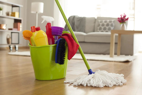 Heavy Duty All Surface Cleaner Concentrated Industrial Blend Kicks Serious Grime Away, cleaning supplies in green bucket, mop included.