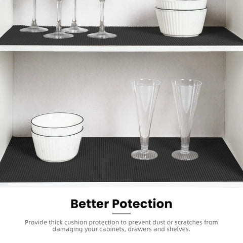 Super Thick Non Adhesive Shelf Liner For Kitchen Cabinets And Drawers Rock Solid Anti Slip Grip on black mat with glassware.