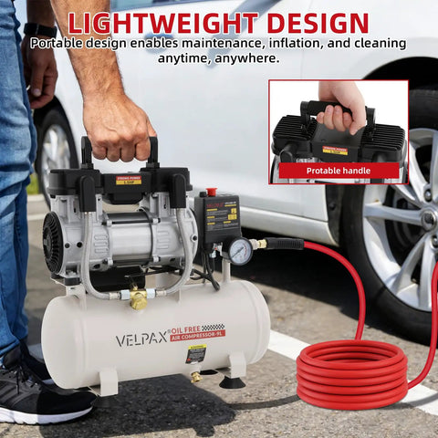 Ultra Quiet 1.5 HP Air Compressor With 2.4 Gallon Steel Tank Operates At Just 60 Dba Noise Level Perfect For Fine Detail Spray Painting Auto Garage Work And Woodworking Nailing Tasks Oil Free Piston Pump Design held by a person, showcasing lightweight portability.