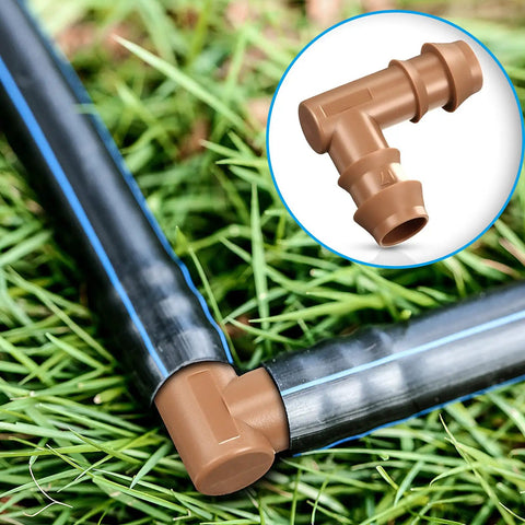 Drip Irrigation Fittings Kit Half Inch Tubing Set With 36 Pieces Including 9 Tees 9 Couplings 9 Elbows 9 End Cap Plugs Barbed Connectors For Sprinkler Systems And Garden Easy Install showing elbow connection in use