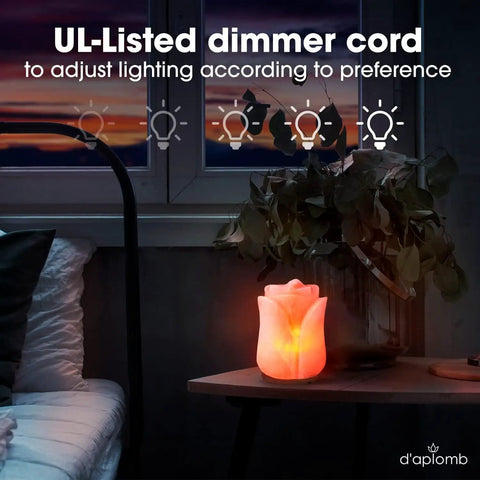 Hand Carved Himalayan Salt Lamp With Rose Crystal Rock Salt From The Himalayan Mountains Authentic Crystal Lamp Dimmer Cord With Pink Flower Accent For Cozy Vibe And Relaxing Ambience with glowing pink flower shape on bedside table