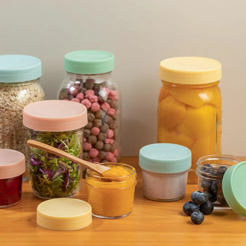 16 Pack Gray Plastic Mason Jar Lids One Piece Tight Seal No Silicone Washers Needed Eight Wide And Eight Regular Mouth Fits Popular Pantry Styles Straight Up Hassle Free Setup For Weekend Canning Batches on jars filled with food.