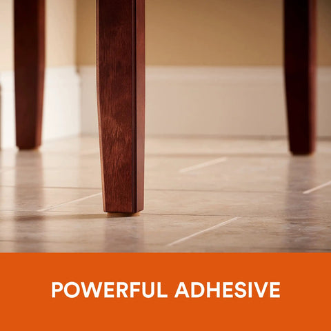 Table leg on floor showcasing Heavy Duty Self Adhesive Gripping Pads For Hard Surfaces One And A Half Inch Brown 8 Count No Slip Furniture Grippers