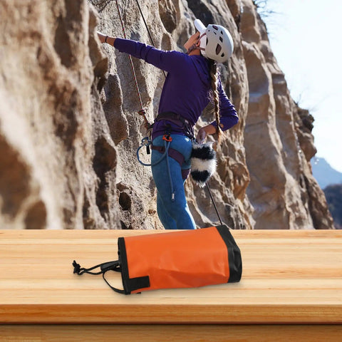 Rock Climbing Gear Bag With Adjustable Waist Belt 5L Pouch For Rope And Chalk Water Resistant Storage Sack in orange and black.