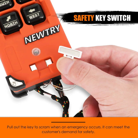 Close-up of Eight Button Wireless Crane Remote Control safety key switch being operated by hand.