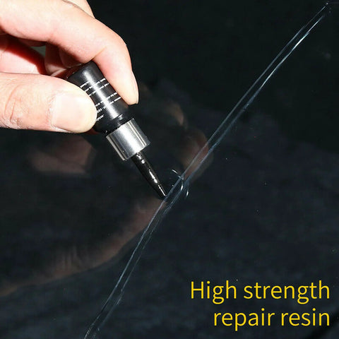 Applying clear resin from 5 Pack Windshield Chip Repair Kit Quick Fix With Glass Repair Resin Liquid For Auto Glass on windshield