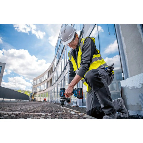 Professional Brushless 18 Volt Cordless Drill Driver Featuring 150 Nm Beast Mode Torque And Heavy Duty Rugged Build To Slam Through Any Worksite Project Today Without Breaking A Sweat being used by a construction worker.