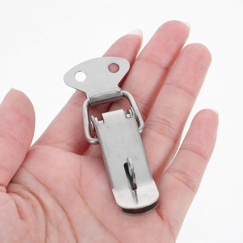 Get Six Nifty 72mm Stainless Steel Toggle Lock Clasps And Screws For Super Easy DIY Box Latching Jobs Without Any Tools In Shiny Silver Finish Today. Handheld latch close-up