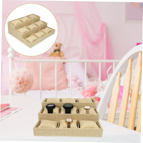 9 Slot Watch Tray Linen Storage Organizer With Cushioned Dividers Jewelry Display Plate Secures Watches Rings And Earrings While Keeping Your Stash Sharp on a dresser.