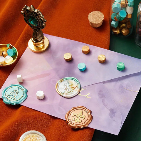 Hella Durable Brass Wax Seal Stamp on colored envelope with decorative sealing wax for DIY crafts and stationery.