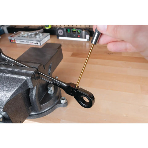 Person using Brass Roll Pin Punch Set With Knurled Steel Handles 8 Inch 5 Piece For Deep Pins Reach In Tight Spots on machinery