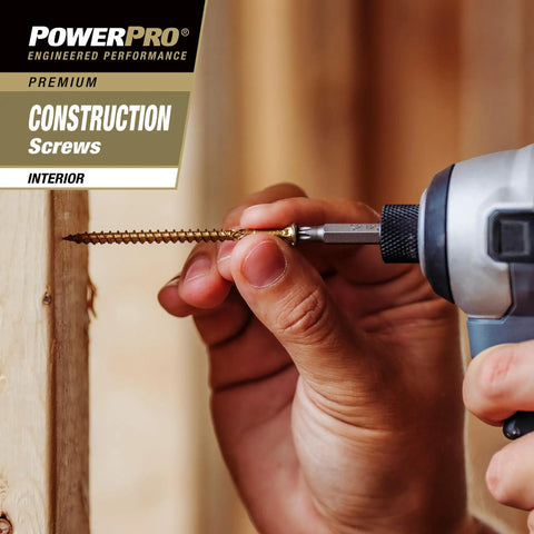 Close-up of a hand drilling a premium exterior wood screw for outdoor decking projects with self-starting tip in wood.