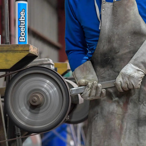 Worker using Heavy Duty Solid Lubricant For Minimum Quantity Lubrication MQL Systems Multi Use White Push Tube 3.5 Oz
