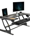 Electric Height Adjustable Desk Converter With Sit To Stand Function And Dual Monitor Riser 42 Inch Workstation Stand Up Desk With USB Port Black Finish No Fuss Electric Lift For Home Office with laptops and monitor setup