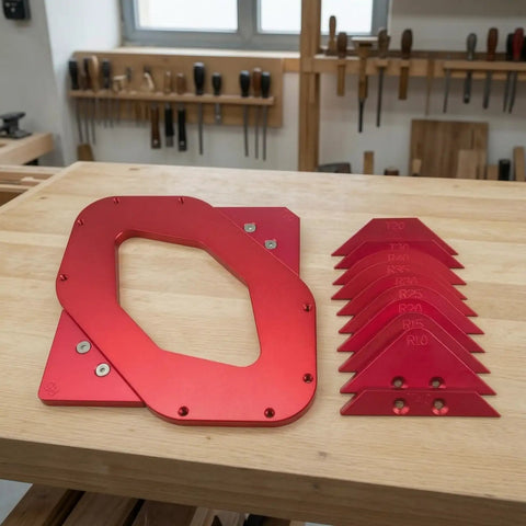 Professional Grade Built Tough Router Corner Template Jig With Interchangeable Curvature Plates And Red Anodized Aluminum Frame showing templates on wooden workbench.
