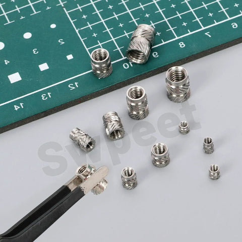 Close-up of 101 Piece Threaded Insert Kit For 3D Printing M2 To M6 In 12 Sizes 303 Stainless Steel Heat Set Inserts and Knurled Nuts.