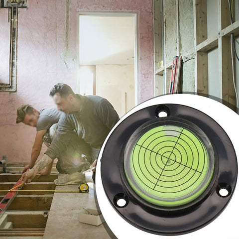 Micpointik Round for spirit Level Bubble showing clear green bubble in a construction setting with workers leveling floors.