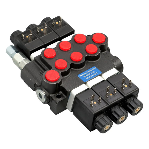 Angled front-right view of a three-spool hydraulic control valve with red port caps, black cast body, three solenoid coils.