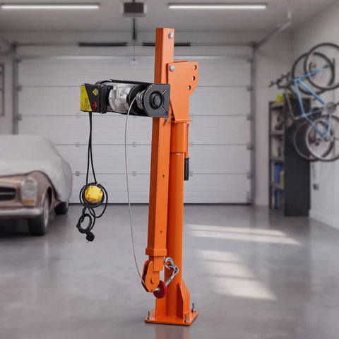 Heavy Hitter Electric Pickup Truck Crane featuring a 3500 Pound Electric Winch and 360 Degree Swivel Folding Hoist in garage.