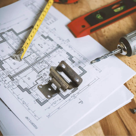 Heavy Duty Self Closing Cabinet Hinges Half Inch Overlay Semi Concealed Steel on blueprint with a drill and tape measure