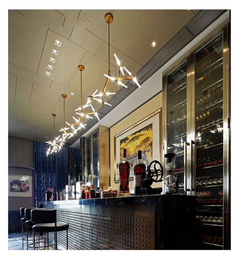 Post-Modern Nordic Pendant Light Herringbone Contemporary Living Room Dining Room Dimmable G9 Bulb Hanging Lamps LED in stylish bar setting.