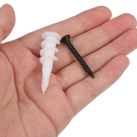 Heavy Duty Wall Anchors And Screws Kit With 100 Sets For Mounting Accessories Stainless Steel Build And Pull Out Resistant Grip Durable Expansion Screws For Drywall Easy Install And Long Lasting Support, white anchor and black screw in hand
