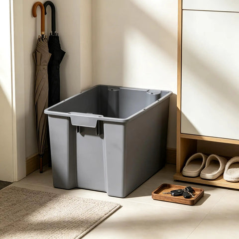 Medium Open Top Stackable Plastic Storage Bin With Reinforced Carry Handles Heavy Duty Gray Utility Tote in corner by umbrellas.