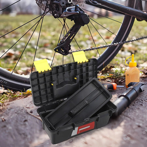 Open 10 Inch Plastic Toolbox With Dual Layer Organization next to bike and tools, ideal for electricians and carpenters.