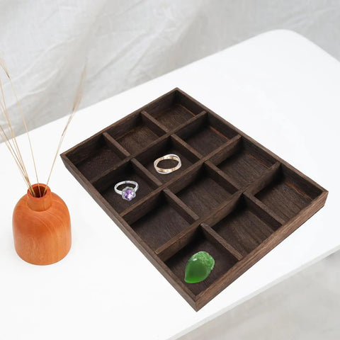Vintage Solid Wood Jewelry Tray With 12 Spacious Compartments Smooth Edge Ring Holder, displaying rings on a flat surface.