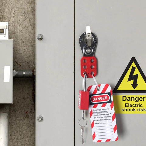 Top Shelf 10 Pack Lock Out Tag Out Hasps Rock Solid Stainless Steel Safety Hardware with nylon handles on a locked cabinet.