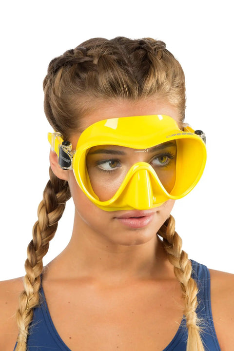 Person wearing yellow Frameless Snorkel Mask Kit With Dry Top Snorkel Ultra Clear Lenses Low Volume Design Push Button Buckle