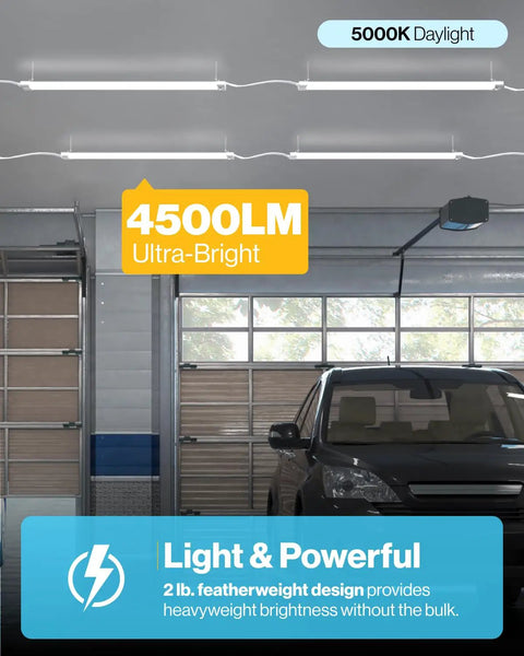 Beast Mode 4 Foot Led Shop Light Plug In Linkable Work Lamp in garage, 4500LM, bright white glow with frosted cover.