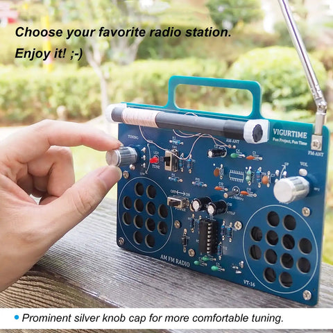 Person using AM FM Radio Kit For DIY Soldering Projects And Electronics Teaching Hands On STEM Gift Dope Stereo Receiver Complete Parts Kit With Full Color Manual Upgraded VT-16 Version Easy Build For Beginners on a wood surface.