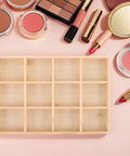 Knockout Solid Wood Jewelry Tray With 12 Grid Compartments, organized with makeup, blush and lipsticks, hardwood finish.