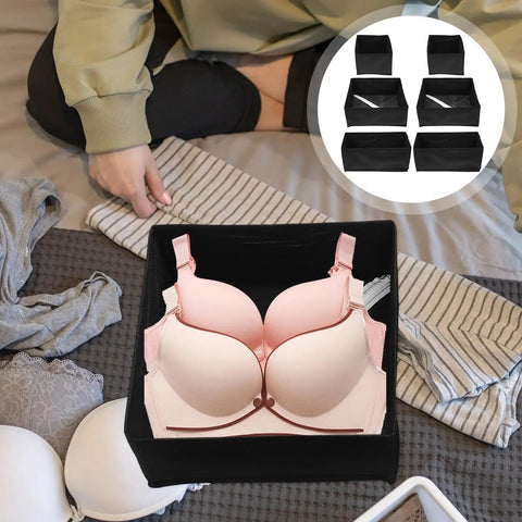 Hella Durable Non Woven Underwear Drawer Organizer Unit With Multiple Divided Compartments To Keep Your Socks Locked Tight And Maintain A Spotless Home Storage Setup On The Regular organizing a pink bra in a black textile drawer compartment.