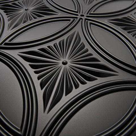 Close-up of Black PVC Drop Ceiling Tile 2x2 Ft With Glue Up 3D Wall Panel Look, showcasing detailed texture and design.