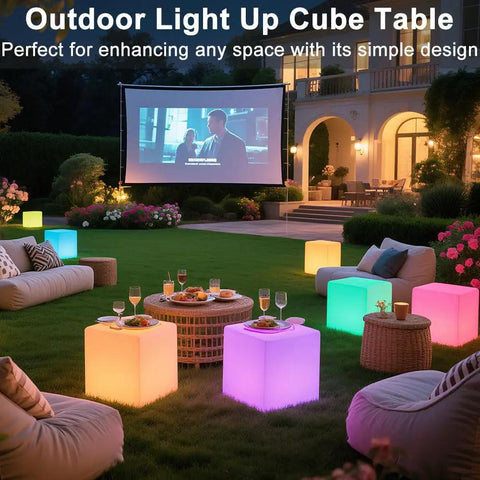 Lit RGB Color Changing LED Cube Seat 14-Inch LED Cube Chair with glowing colors in outdoor patio setup during evening event.