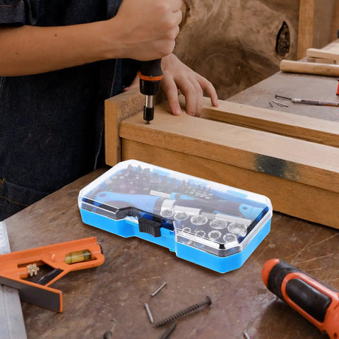 Gutsy Heavy Duty Ratchet Socket Wrench Kit With Extra Screwdriver Bits And A Snap Shut Carry Case Tough Hand Tool Set on workbench.