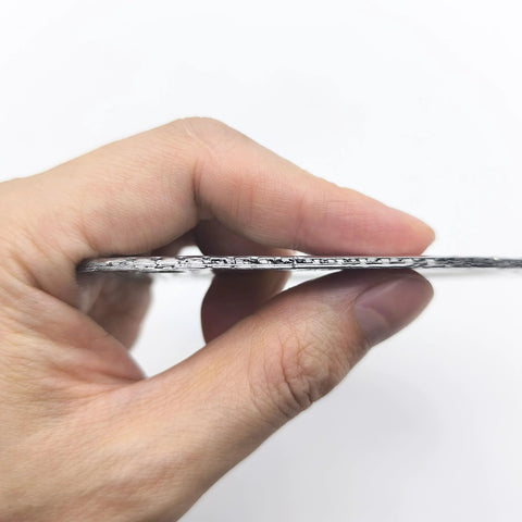 Side view of a 3-inch exhaust gasket with graphite seal for a 3-bolt 3-hole collector