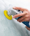 Hand using power tool with 2 Inch Hook And Loop Sanding Pad For Sanding Discs With Quarter Inch Shank Drill Attachment And Soft Foam Buffering Pad