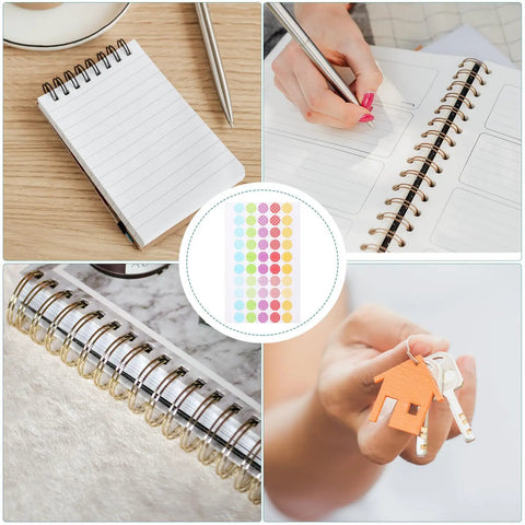 Heavy Duty Hole Punch Reinforcement Stickers Six Sheets For Loose Leaf Paper Fixes That Patch Broken Ring Bindings And Keep Your Class Notes Intact With No Sweat This Semester on a notebook with a pen.