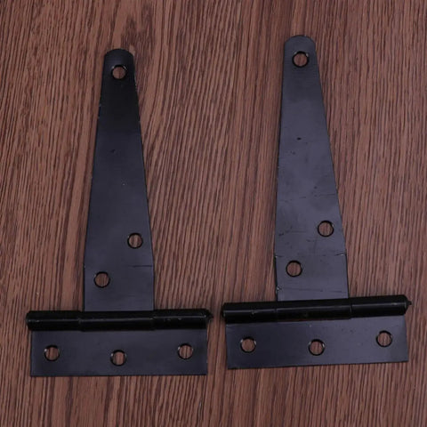 Heavy Duty Iron Black T Shape Door Hinges Set 24 Pieces 4 Inch Gate Hinges With Six Screw Holes on wood surface